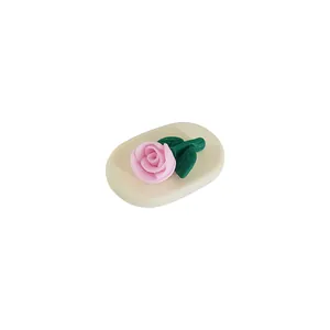 3D pink rose tulip duckbill hair clip with green leaves on white background