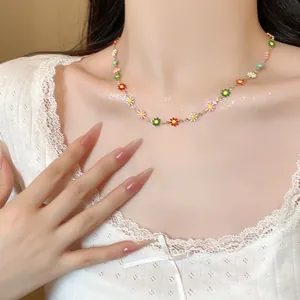 Colorful daisy enamel necklace with gold chain for women in a fresh, stylish design