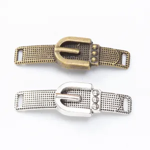 Vintage alloy belt buckle connectors in bronze and silver finishes with embossed texture