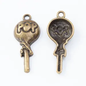 Retro bronze lollipop pendant with POP lettering and vintage metal texture for DIY jewelry