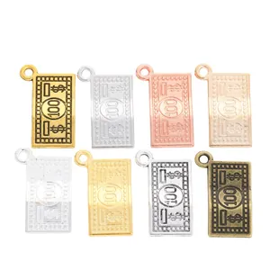 Vintage alloy dollar sign 100 bill pendants in gold silver and bronze colors for DIY jewelry