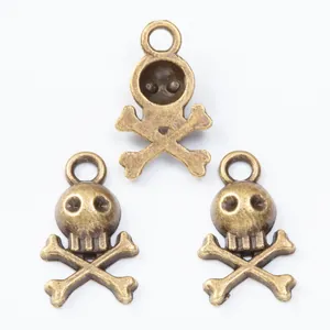 Vintage bronze skull and crossbones metal pendants for DIY jewelry making and crafts