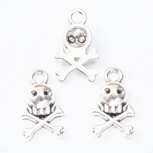 Vintage silver skull and crossbones metal pendants for DIY jewelry making and crafts