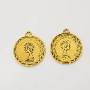 Vintage gold zinc alloy round coin pendant with Queen Elizabeth relief and hanging loop