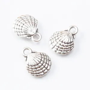 Three antique silver shell pendants with radial texture and DIY ring for jewelry making