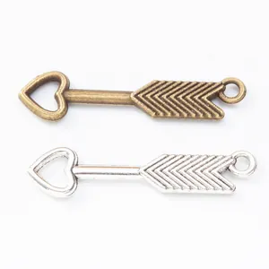 Arrow-shaped alloy pendants with hollow heart ends in bronze and silver for DIY jewelry