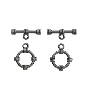 Detail of gunmetal toggle clasps with textured woven finish for DIY jewelry
