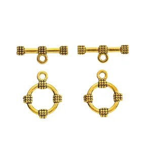 Detailed view of vintage gold OT toggle clasps with intricate woven mesh texture for DIY jewelry