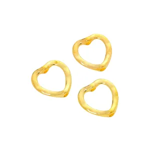 Three pieces of gold vintage heart alloy charms with irregular lava texture for DIY jewelry