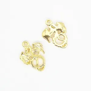 Macro shot of gold western dragon alloy connectors for DIY necklace and bracelet crafting