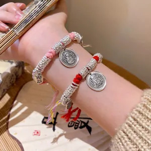 Nieuw Chinees gevlochten armbandje met vintage Fu-hanger en zilveren kralen voor dames