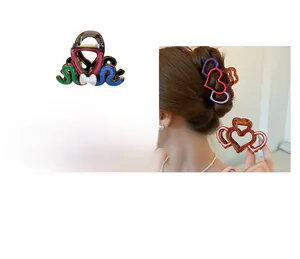 Detailed size view of irregular color-block acetate hair claw clips and heart designs