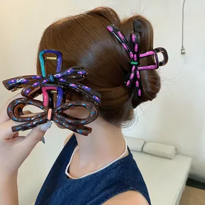 Polka dot bow hair claw clip for women stylish resin hair accessories for bun hairstyles