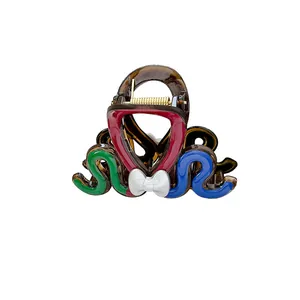Chic irregular heart claw clip with colorful enamel glaze and silver bow detail