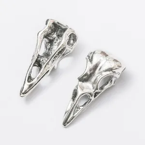 Pair of vintage silver bird skull alloy pendants for DIY gothic jewelry making