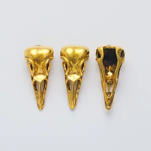 Vintage gold bird skull charms for DIY jewelry making in antique gothic metal style