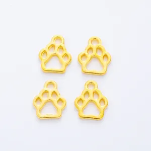 Set of four gold-plated hollow paw print charms for DIY jewelry and accessory making