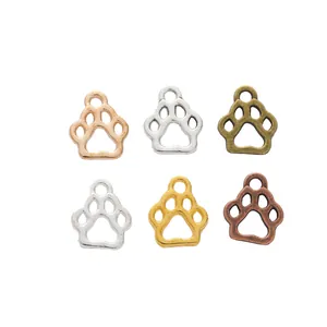 Set of six hollow animal paw print charms in various metallic finishes on white background