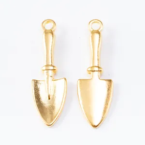 Golden vintage shovel charms in zinc alloy for DIY jewelry making shown in front and back