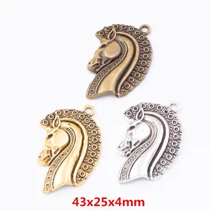 Set of horse head vintage alloy pendants in bronze, gold, and silver finishes, 43x25x4mm