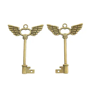 Par de llaves con alas de bronce vintage en aleación para joyería DIY y artesanía