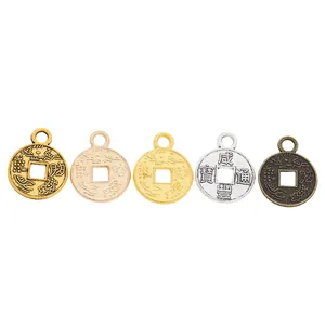 Set of five vintage zinc alloy coin charms in assorted metallic finishes for DIY jewelry