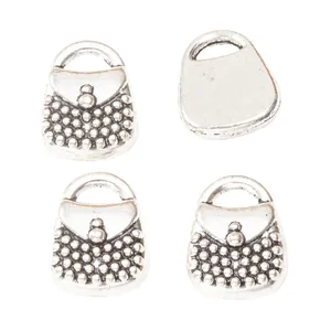 Set of four vintage silver handbag charms for DIY jewelry making with dot texture design