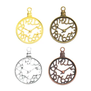 Set of four vintage style clock alloy pendants in gold bronze silver and copper tones