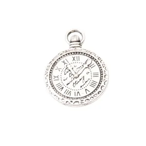 Vintage silver alloy clock pendant with Roman numerals and decorative engraving