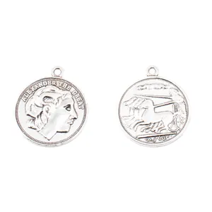 Vintage silver zinc alloy pendant featuring Alexander the Great embossed relief design