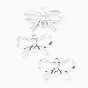 Vintage silver zinc alloy bow charm with double loops for DIY jewelry making accessories