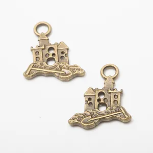 Pair of vintage bronze castle charms made of alloy for DIY jewelry making and crafts