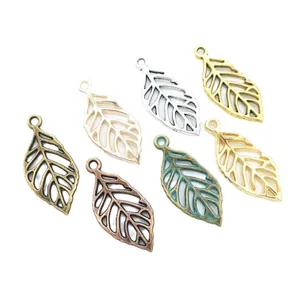 Lot de 7 pendentifs feuilles évidées vintage en métal pour la création de bijoux