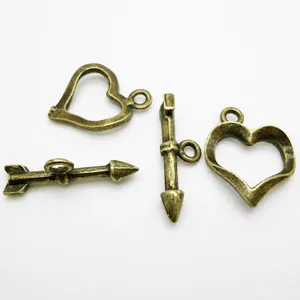 Fermoirs à bascule en bronze antique en forme de cœur pour la création de bijoux DIY