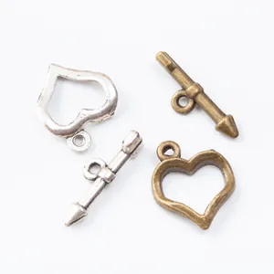 Fermoirs bascule en forme de coeur, argent et bronze antique pour création de bijoux