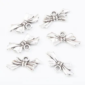Set of 6 vintage antique silver bow pendants for DIY jewelry making and crafting