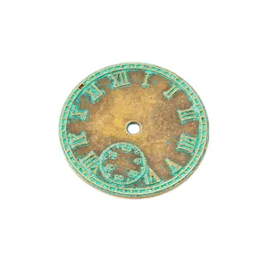 Macro view of vintage bronze alloy gear clock pendant with Roman numerals and patina finish
