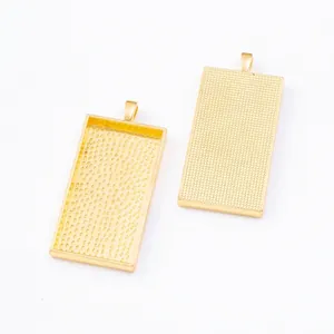 Front and back detail of 24x47mm gold vintage rectangle pendant base for DIY jewelry