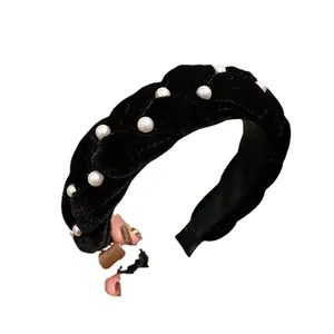Handmade velvet headband with white faux pearls featuring a high-crown woven design