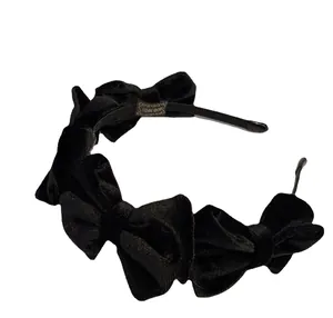 Handmade black velvet headband featuring five continuous bows for a cute Korean style