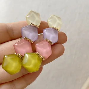Handmade geometric resin hair clips with pastel hexagonal crystals and rhinestone accents