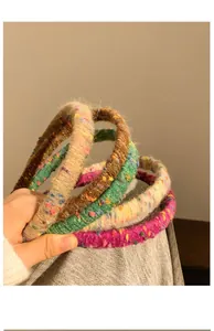 Macro shot of knitted headband set featuring colorful wool texture and soft autumn tones