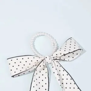 French bow hair tie with faux pearl rings and white black polka dot ribbon hair scrunchie