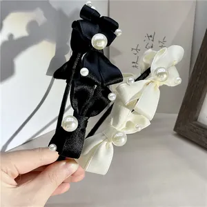 Elegant bow headband with pearls in black and white silk satin for women's hair accessory
