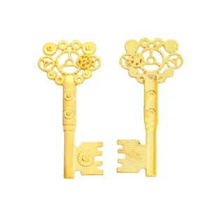 Macro view of steampunk alloy gear keys in bright gold finish for DIY jewelry making