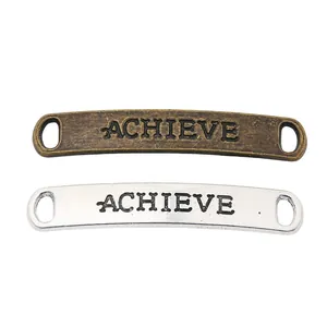 Antique bronze and silver metal alloy connectors with embossed ACHIEVE text