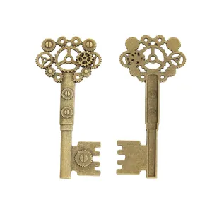 Vintage bronze steampunk keys with intricate gear and screw details on white background