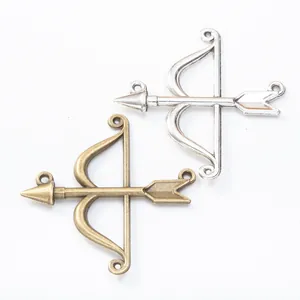 Vintage alloy bow and arrow charms in silver and bronze finish for DIY jewelry
