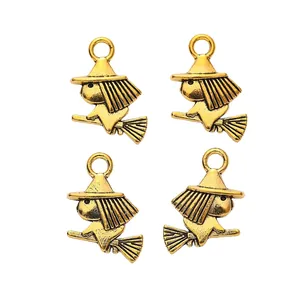 Set of four vintage antique gold witch on broomstick charms for DIY jewelry making