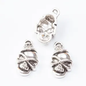 Three vintage silver skull pendants made of zinc alloy for DIY jewelry making and crafts